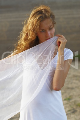 Young woman with white scarf