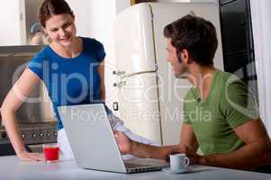 couple having breakfast in the kitchen