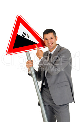 businessman with road sign climb