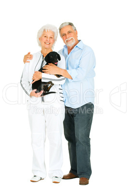 elderly couple with a dachshund