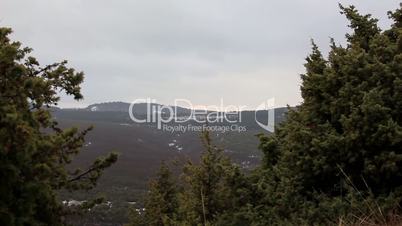 Winter cloudy, windy weather in the mountains (Time Lapse)