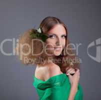 Beauty girl with hair style smile in green cloth