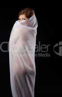 Beauty nude woman in dark hide transparent cloth