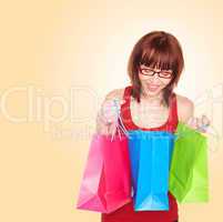 brunette woman with shopping bags