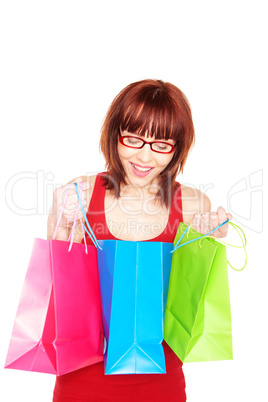 Happy Shopper Looking In Carrier Bag