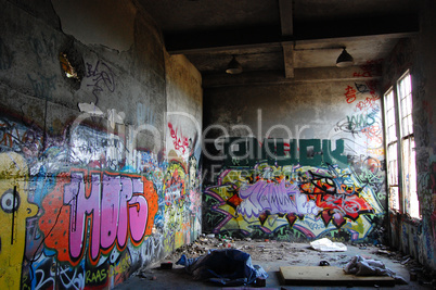 Abandoned room with graffiti