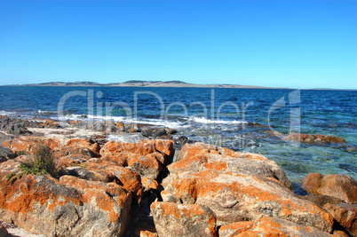 Red stones in harbour