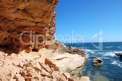 Red rock and ocean