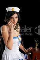 Young sailor talking by phone