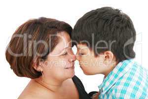 mother and son about to kiss - isolated over white