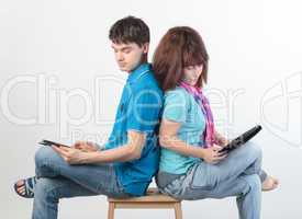 A young couple with a Tablet PC