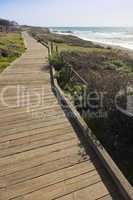 Wooden Walkway Along Ocean Coast
