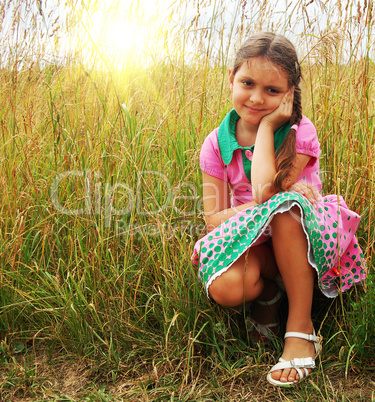 little girl on the meadow