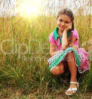 little girl on the meadow
