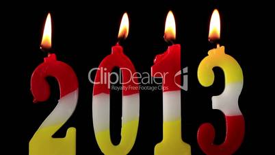 Happy New Year 2013, candles burning, time lapse