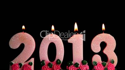Happy New Year 2013, candles burning, time lapse