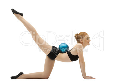 girl in black training cloth with gymnastic ball