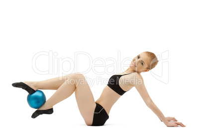 young gymnast play with blue ball