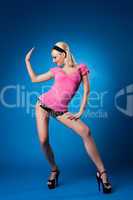 Beauty woman in rose dance on blue background