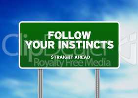 Green Road Sign - Follow Your Instincts
