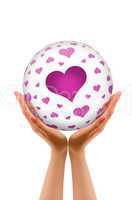 Hands holding a Love Sphere