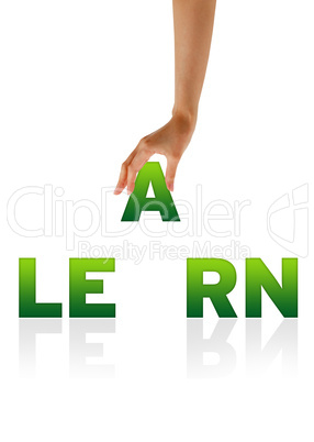 Hand holding letter A of word Learn
