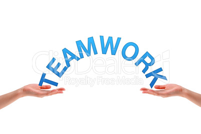 Hands holding the word teamwork