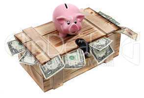 pink piggybank on wooden case with dollar notes