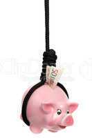 piggy bank with european banknote and black rope