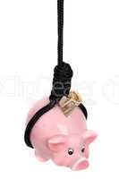 piggy bank with dollar banknote and black rope