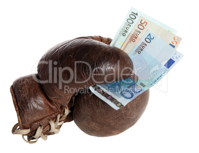 boxing glove with banknotes