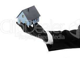 house offered by black rubber glove