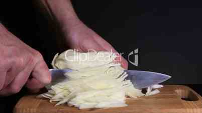 Cutting the white cabbage