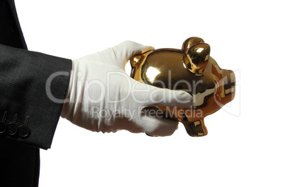 butler with white glove an golden piggybank