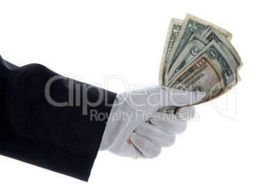 hand with glove holding bunch of dollars