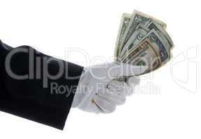 hand with glove holding bunch of dollars