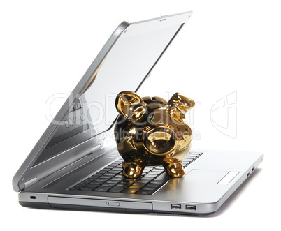 golden piggy bank on notebook