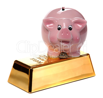 gold bullion with pink piggy bank