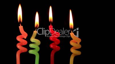 Candles on a Birthday cake burning down, time lapse