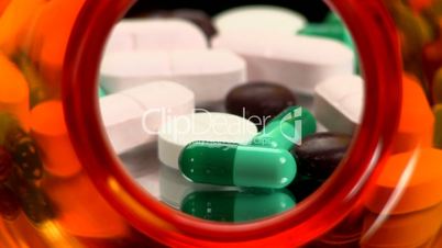 Drugs and Medicine; capsules, pills and tablets from inside bottle