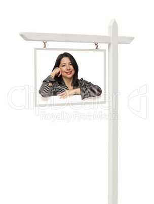 Real Estate Sign with Smiling Hispanic Woman