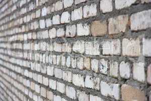 Old white brick wall