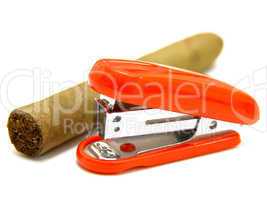 Red stapler and cigar