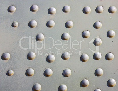 A silver painted metal aircraft background  with  rivets.