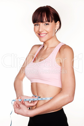 Joyful Woman Measuring Waist