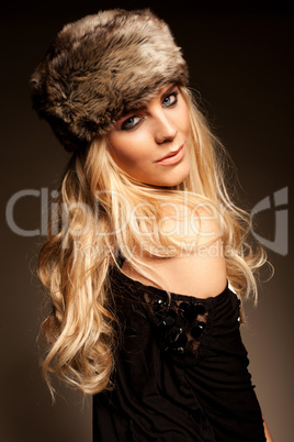 blonde woman in a fur hat