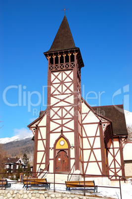 The old wooden Catholic church at ski resort, Tatranska Lomnica,