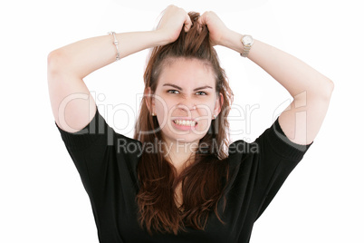 Stress. Business woman frustrated and stressed pulling her hair.