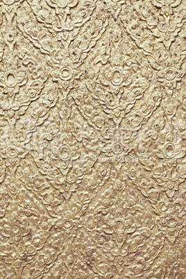 brown background with golden patterns