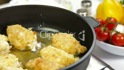 Food Preparation - Frying Chicken Breast Rolls